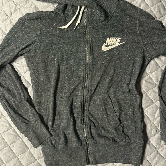 Nike Tops - Women’s Nike size small zip up sweat shirt.